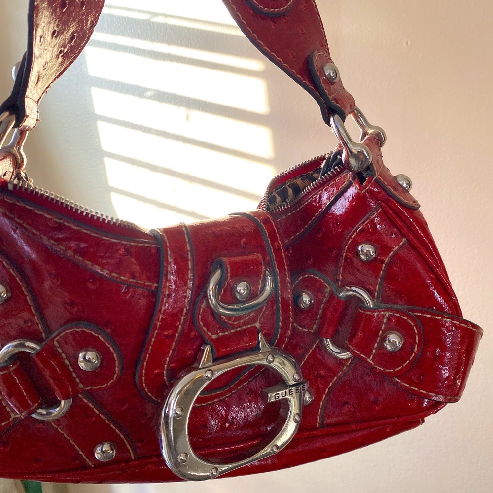 Red faux leather, ostrich Guess satchel purse